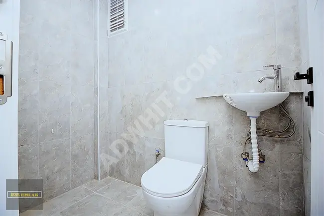 Apartment for sale with an area of 3+1 on the ground floor in BAHÇELİEVLER YAYLA