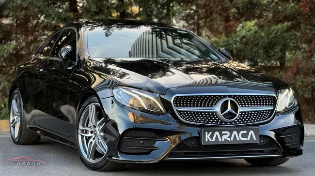 Mercedes E 300 AMG 9G-Tronic من الوكيل+ جلد بني+ بدون طلاء 112,000 كم