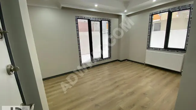 New 1+1 apartment with an area of 55 square meters, closed kitchen and private garden from LİDYA EMLAK