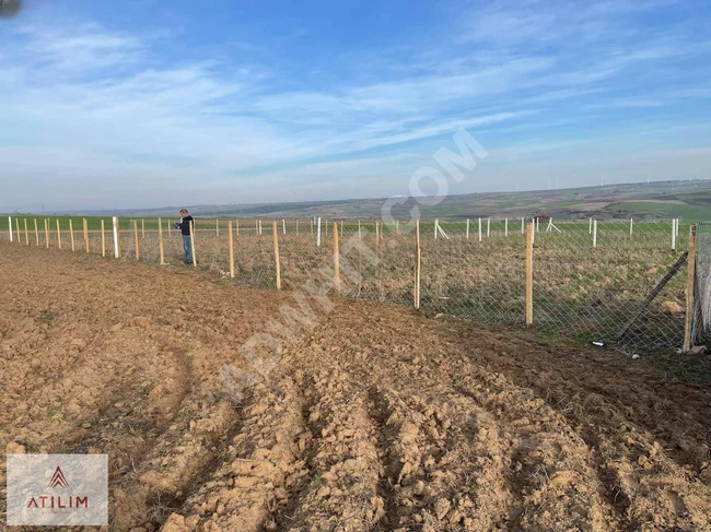 There is a plot of land with an area of 853 square meters surrounded by a fence. In Silivri Değirmenköy