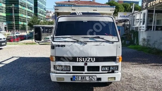 1995 ISUZU NKR شاحنة ذات عجلتين بصندوق خشبي مفتوح- من ÜÇYAY OTOMOTİV