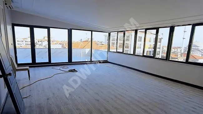 Apartment for rent on the top floor with a special design on the walking road in Bağcılar