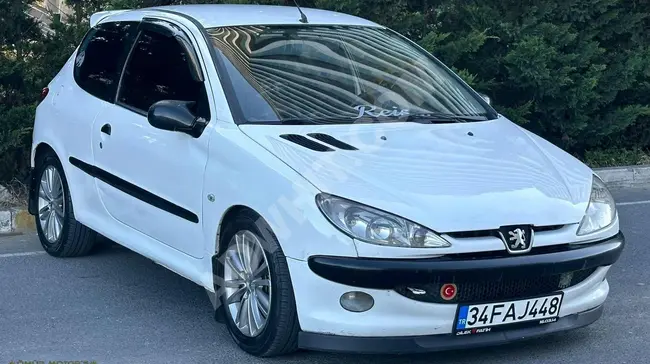 **TAKSİT SEÇENEKLİ** ÖMÜR MOTORSDAN PEUGEUOT 206 KLİMALI