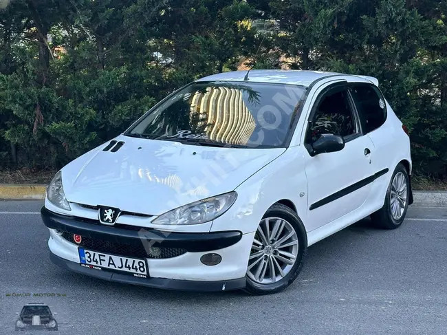 **TAKSİT SEÇENEKLİ** ÖMÜR MOTORSDAN PEUGEUOT 206 KLİMALI