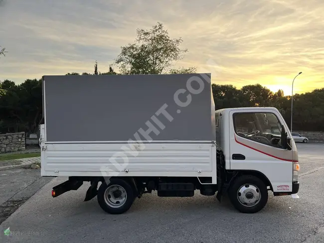 MITSUBISHI FE711 truck model 2008, 6 new tires, open body with tarpaulin cover.- by HUZUR