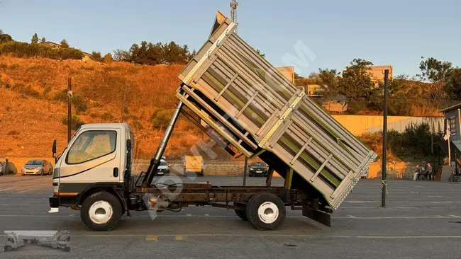 MITSUBISHI FE 659E truck, model 1999, equipped with a new tipper box