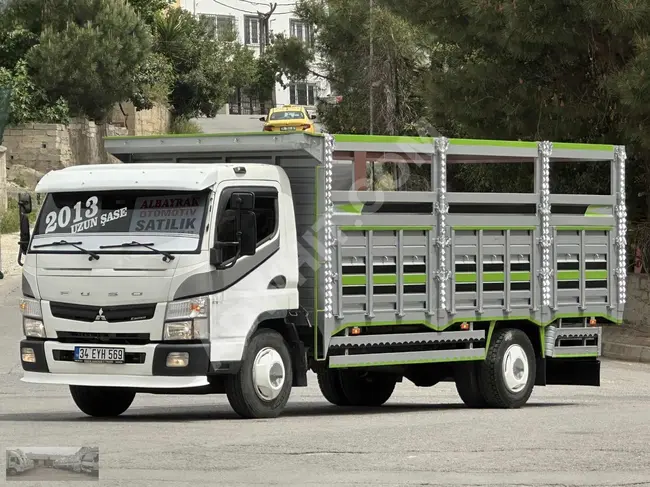 Truck "FUSO B75L" model 2013 with a long chassis and open box from ALBAYRAK OTOMOTİV