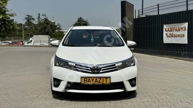 2015 - TOYOTA COROLA SEDAN  - اوتوماتيك - امكانية اقساط لمدة 24 شهرا