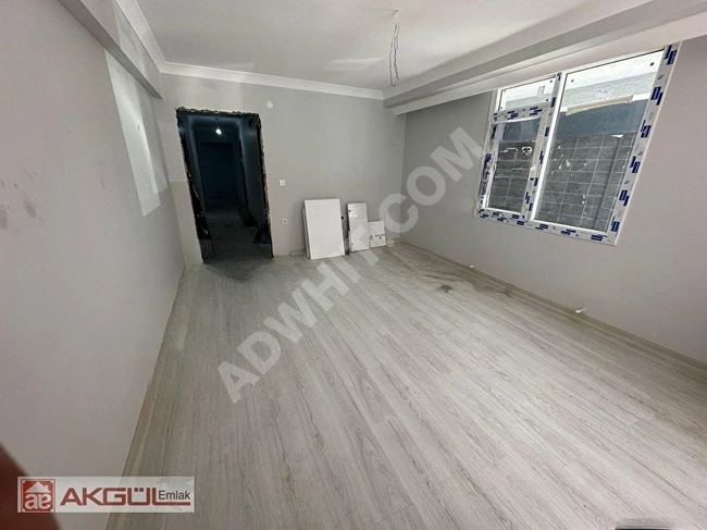 Apartment 2+1 for sale on the elevated ground floor in a new building near BAHÇELİEVLER İSKİ with a floor ownership deed (KAT MÜLKİYETLİ)