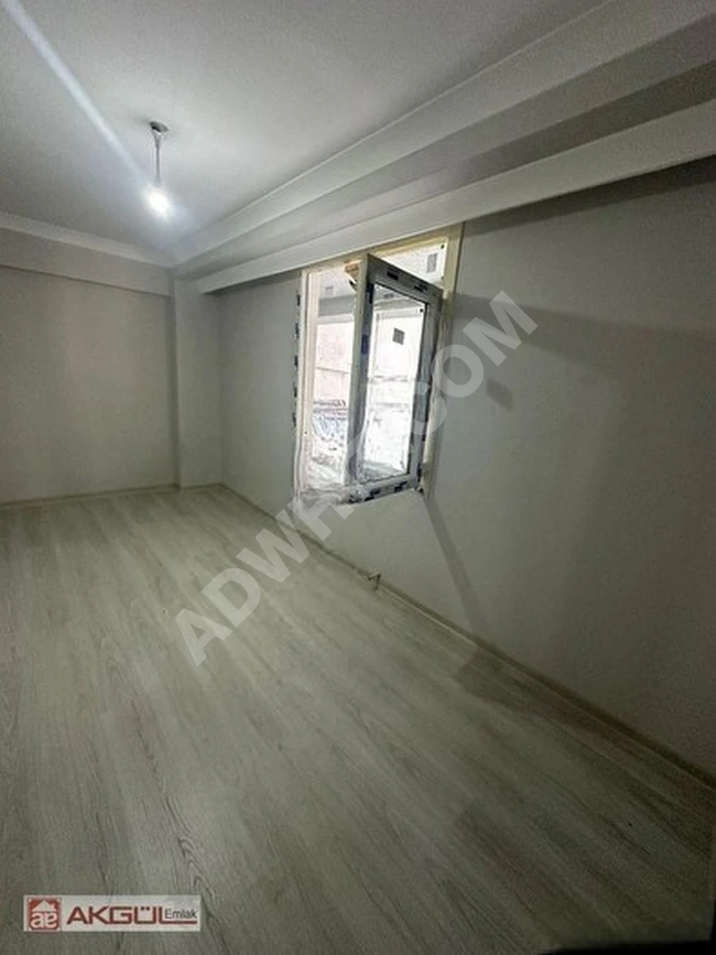 Apartment 2+1 for sale on the elevated ground floor in a new building near BAHÇELİEVLER İSKİ with a floor ownership deed (KAT MÜLKİYETLİ)