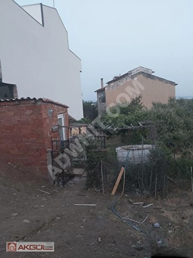 Independent land for sale with an area of 165 square meters, suitable for construction, and with a housing certificate under number 105 - Building permit for 3.5 floors and with an area of 120 square meters for upper floors in the area of BALIKKESİR/EDREM