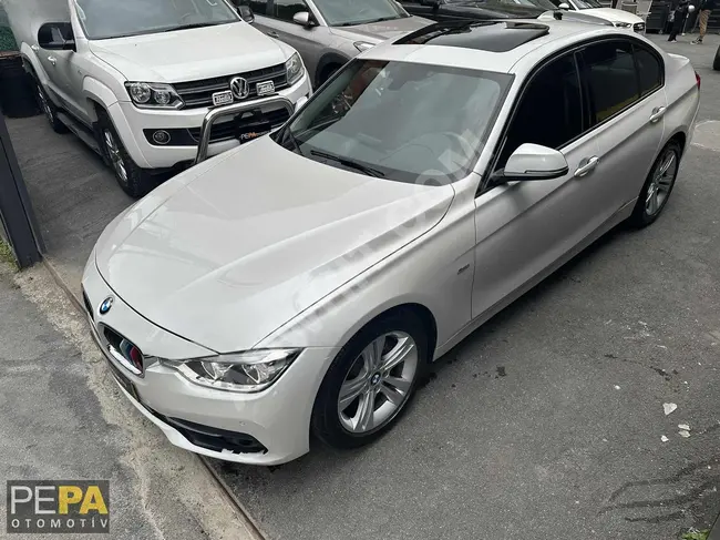 BMW 320i ED Sport Line model 2016 in white 77,000 km from PEPA OTOMOTİV