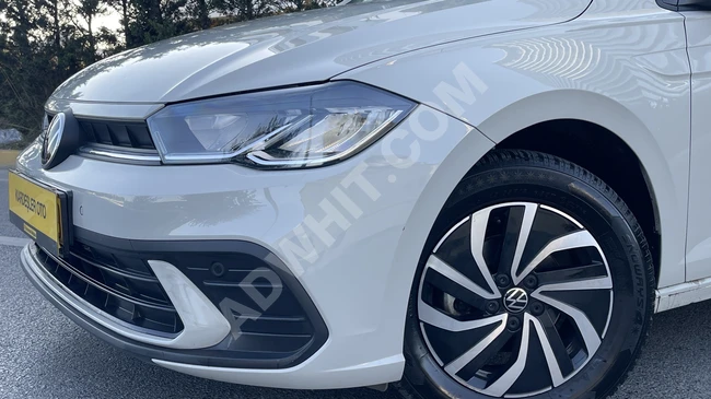 2023 - VOLKSWAGEN POLO 1.0 TSİ FİLE DSG - شاشة عداد ديجيتال - مرايا قابلة للطي - مصابيح ZENON - عداد 7000 كم