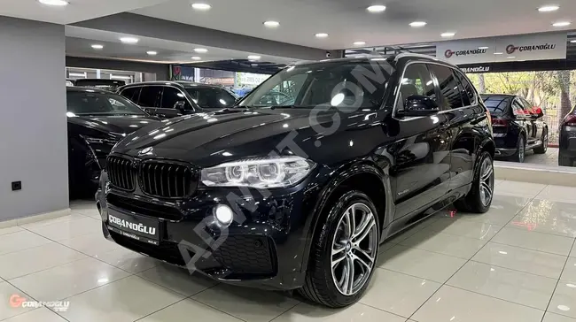 BMW X5 X-DRİVE-M SPORT-PREMİUM 2018 - مقاعد بلون بني , عداد ديجيتال , جنوط 20 بوصة , بدون طلاء