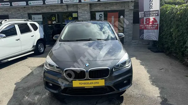 K KARTINA 12 TAKSİT İMKANI İLE BMW 216 D OTOMATİK 110 BİN KM ORJ