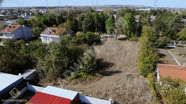 A plot of land measuring 1565 square meters for sale, in the villas area in the İZZETTİN neighborhood