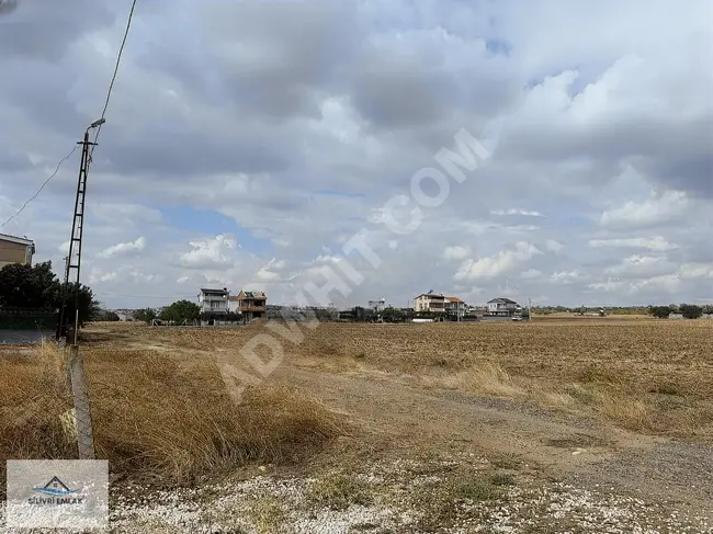 Investment land suitable for construction with an area of 150 square meters in YENİÇİFTLİK