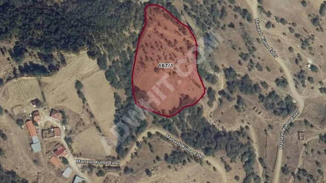 Land suitable with an area of 7,120 square meters inside the village of Uşak Eşme Manavlı Köy