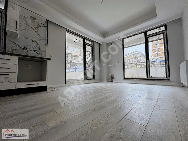 New 1+1 apartment with a garden directly on the street - from İNTER WORLD