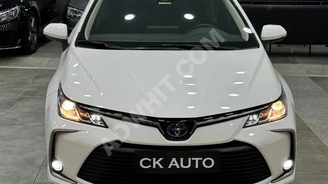 سيارة TOYOTA COROLLA 1.8 HYBRİD DREAM موديل 2021 - مسافة 77.000 كم - بدون دهان