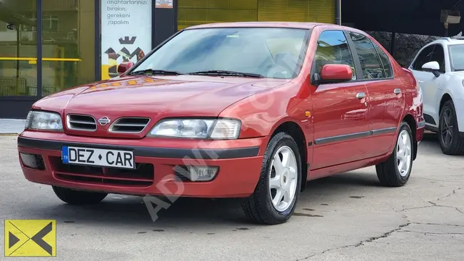 Nissan Primera model 1999 from its first owner - via DEZCAR