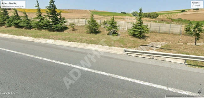 Land for sale with an area of 2016 m² next to the MURATBEY highway