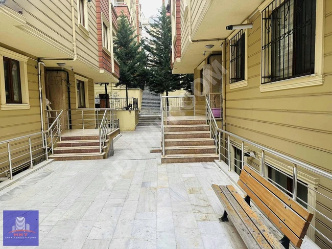 2+1 apartment for sale on the ground floor with a garden within a complex and located on İKBAL Street by MNY REAL ESTATE.