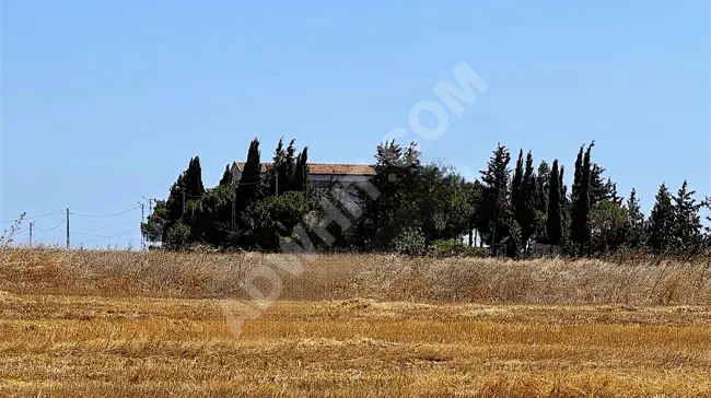 قطعة أرض للبيع في GÜMÜŞYAKA بموقع ممتاز ومجاورة للبناء