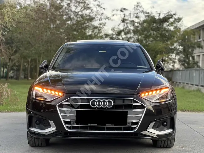 Audi car model 2020, 100,000 km, equipped with a panoramic roof, seat heating, comprehensive vision, and a digital dashboard display