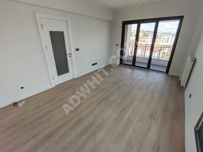 Apartment 2+1 for sale with an area of 80 square meters within the KİPTAŞ Doğankent Evleri complex in the Güngören area