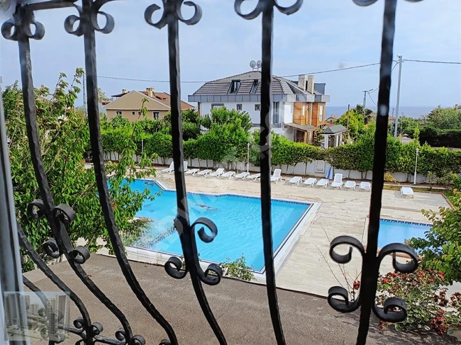 For sale independent villa with a pool inside a complex in Selimpaşa