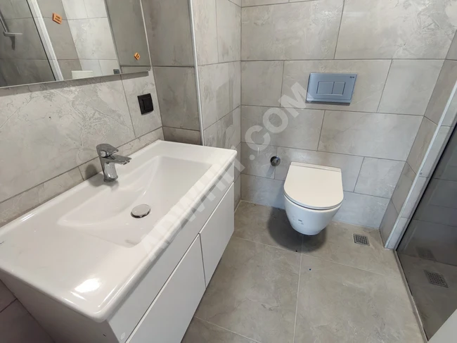 Apartment 2+1 for sale with an area of 80 square meters within the KİPTAŞ Doğankent Evleri complex in the Güngören area