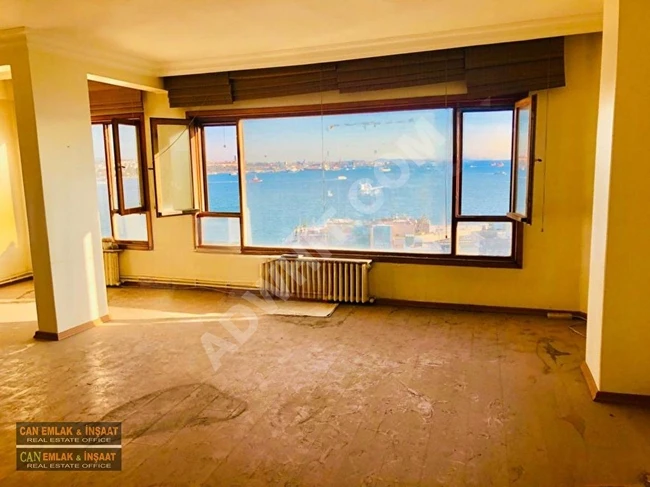 Apartment (2+1) with an area of 95m² in Cihangir, with a wonderful panoramic sea view, very sunny, equipped with combi heating.