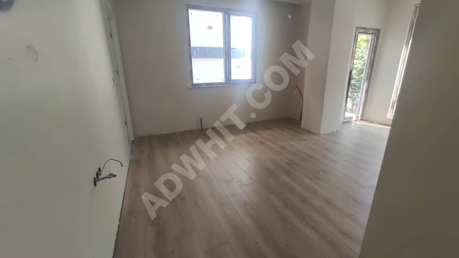 2+1 apartment, with an open kitchen, 300 meters to ÇARŞI metro station, with a raised entrance.