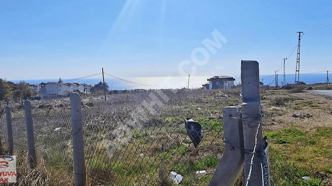 A plot of land with an area of 588 square meters licensed for construction with a sea view in the KUMBURGAZ area.