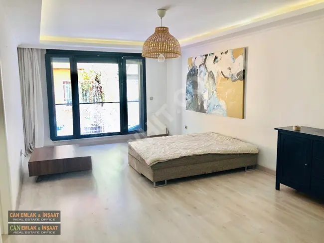 Apartment in Cihangir, 5 minutes from Taksim, in a new and modern building, with a balcony, elevator, (2) air conditioners, central heating.