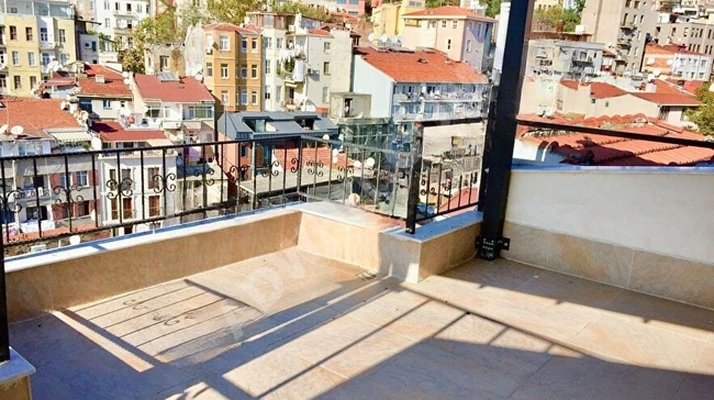 Refurbished duplex apartment 3+1, with a terrace and two balconies, equipped with air conditioning and central heating, overlooking the city in Cihangir Firuzağa.