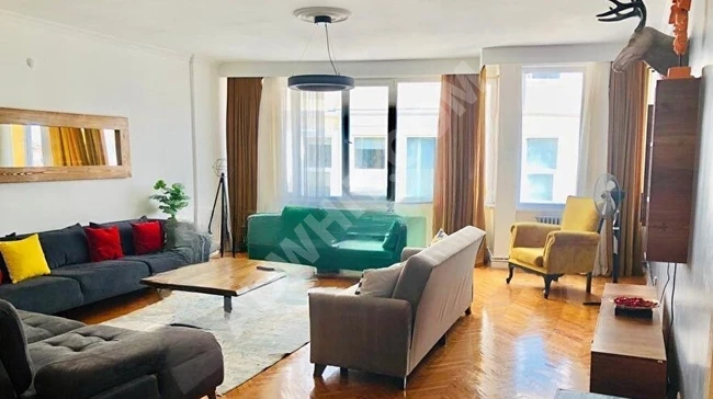 Furnished apartment of 140 square meters (3+1) with an elevator and bright with a balcony in the heart of Taksim Cihangir on the main street.