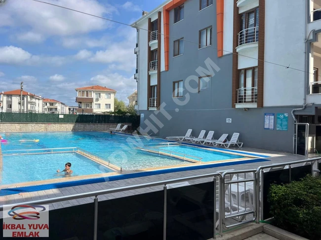 Apartment for sale on the second floor in the DİAMOND PARK EVLERİ complex, located in the KARASU YALI neighborhood.