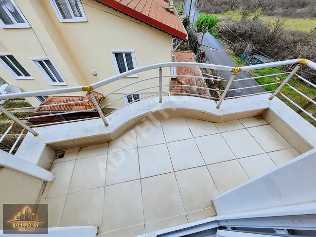 Opportunity: Spacious corner apartment with balcony and fireplace in a new building by DELUXE 26.