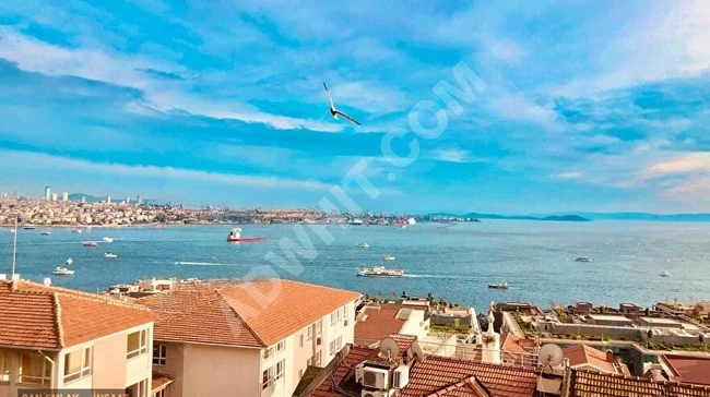 2+1 Apartment (95 m²) in Cihangir with an unparalleled sea view, fully renovated, fully furnished, with two air conditioners and a central heating system (combi).