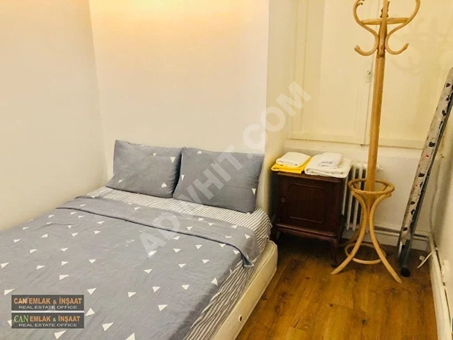 Furnished apartment of 140 square meters (3+1) with an elevator and bright with a balcony in the heart of Taksim Cihangir on the main street.