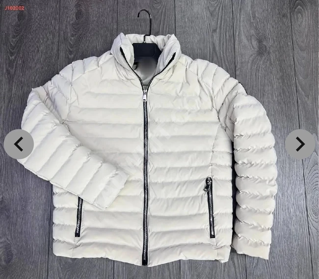 Winter puffer jacket with a zipper