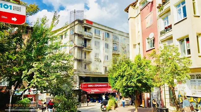 A commercial property in the heart of Cihangir, on the main street, direct entry, two floors, good rental yield, with an area of 60 square meters.