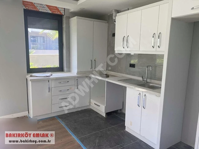 Lara Loft Sitesinde 1+1 50m2 Havuzlu Kapalı Garajlı Bahçe Katı