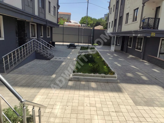 Apartment for sale 2+1 in a luxurious location within a complex with 24/7 security, close to FİNANS MERKEZİ.