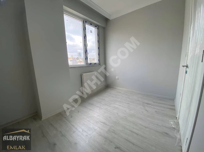 New 2+1 apartment for sale with a completely open front view, a spacious kitchen, parking, and with an İSKAN document.