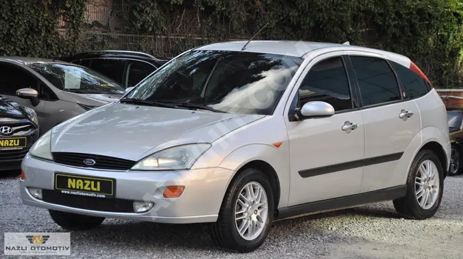 FORD FOCUS GHIA 2001 - (We have the option of payment through bonds)