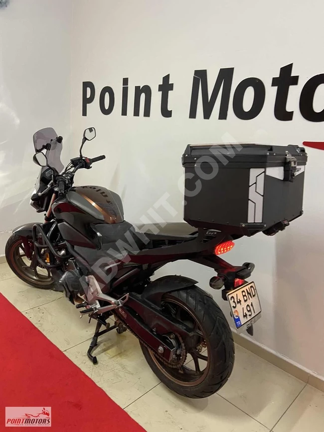 A motorcycle with installment and trade-in options available from Point Motors.