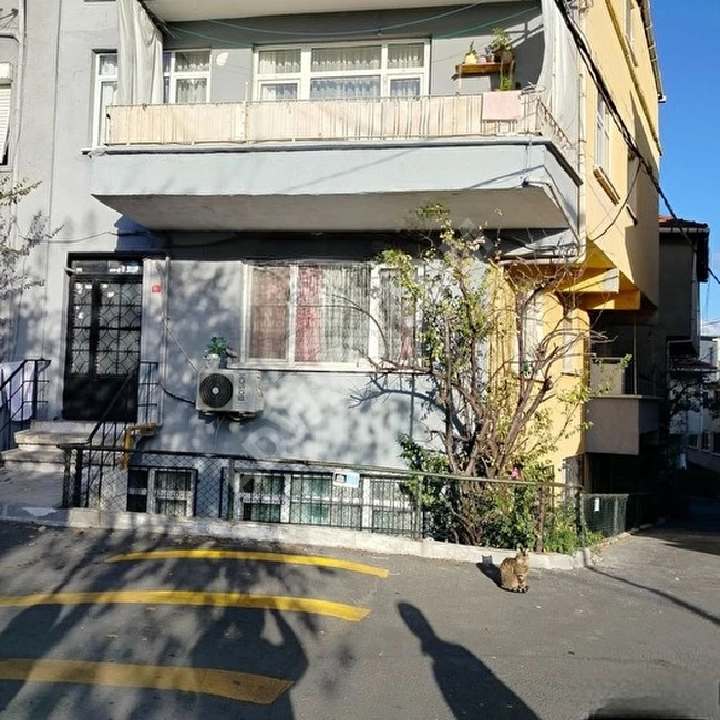 A building consisting of 4 floors with an area of 126 square meters for sale in KURUÇEŞME by AKSU EMLAK.